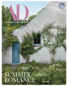 AD magazine cover with a white house covered in vines.